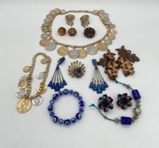 A collection of costume jewellery to include five pairs of clip-on earrings (one pair by Astolfo),