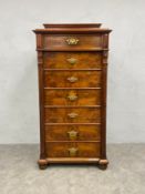 A 19th century figured walnut semainier type tall chest of drawers fitted with locking stile. H.