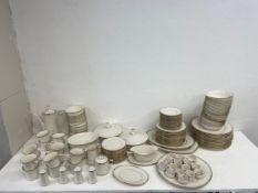 An extensive Noritake Golden Cove dinner service for fourteen settings, dinner plates, soup bowls,