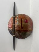 A 1980's Italian sculptural wall art style lamp in pierced and etched metal. W.117cm Dia.58cm.