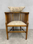 A C.1900 mahogany framed tub armchair with floral upholstered back and seat. H.86cm.