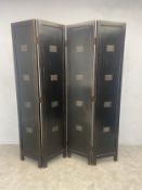 A painted and lacquered four panel screen or room divider each panel inlaid with Chinese writing