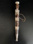 A late 19th century Scottish dirk with celtic knot decorated silver mounts and basketweave handle in