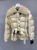 A Moncler Grenoble ladies ski jacket with Moncler protective cover and bag. Medium sized.