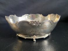 A Scottish silver bowl with scrolling foliate rim and engraved decoration. H.10 W.23cm 492g.