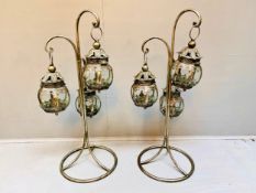 A pair of three branch stands with metal hanging lanterns each fitted with hinged lid. 75 x 34 x