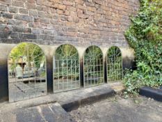 A set of four Regency style garden mirrors, architecturally styled in metal window pane frames. 60 x