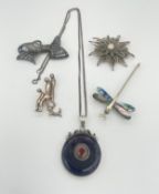 Mixed continental silver to include an amethyst necklace, dragonfly, wirework, marcasite and