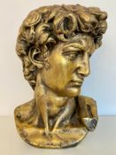 A large bust of Michelangelo's David in moulded ceramic composite. 65 x 45 x 40cm