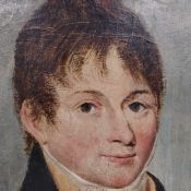 An early 19th century oil on board, portrait of a young man in gilt oval frame. 37 x 32cm