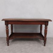 A 19th century mahogany side table with inset leather top on turned supports united by undertier. 75
