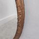 A late 19th century oval wall mirror in giltwood and foliate gesso frame. 92 x 65cm - Image 2 of 3