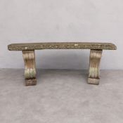 A composite stone garden bench on Regency style scrolling supports. L.138 H.44.5 D.50cm