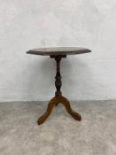 A 19th century style tilt top occasional with stencil decorated top. H.60 W.46 D.46cm.