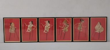 A set of six 19th century Indonesian cow or buffalo hide Wayang Kulit or shadow puppets depicting