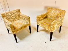A pair of foliate cut velvet upholstered salon armchairs on tapered ebonised supports. 80 x 58 x