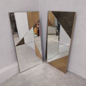 A pair of contemporary gilt metal framed wall mirror with painted panels. 92 x 46cm