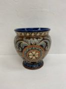 A late 19th century Lambeth Doulton jardiniere with impressed marks to the base. H.23 Dia.21cm.