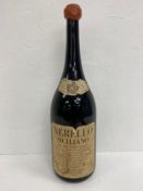 A large 1976 vintage bottle of Nerello Siciliano vino della Sicilia Orientale marsala wine from