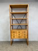 A mid-century Remploy Lundia Prefab Storage System open bookcase fitted with a filing cabinet