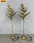 A pair of contemporary simulated brass floor lamps in the form of stylised Heliconia plants. H.