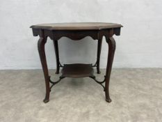 A C.1900 walnut centre or occasional table on cabriole supports united by undertier. H.89 W.80 D.