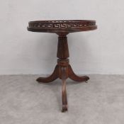 A Regency style teak lamp or occasional table with Greek key pierced frieze on reeded column and
