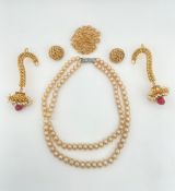 Trifari brooch and earring set, a pearl necklace and a pair of earcuffs, longest 34cm.