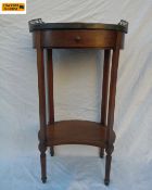 A 19th century mahogany lamp table with pierced brass gallery surround and painted top over a single