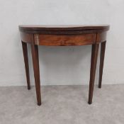A Georgian mahogany and satinwood strung demi-lune card table with foldover top on gateleg action