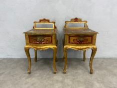 A pair of painted and gilt Florentine bedside cabinets with mirrored backs above frieze drawers on