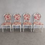 A set of four contemporary 19th century style French dining chairs in distressed painted frames