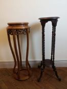 A Chinese hardwood plantstand with pierced and carved frieze along with a 19th century style