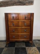 A mid-century walnut chest of four long drawers on cabriole supports. H.95 W.77 D.41cm.