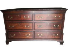 A Georgian country oak and mahogany crossbanded mule chest or coffer with lift up top above dummy