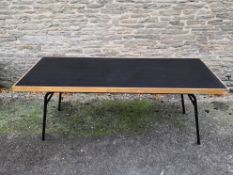 A mid-century dining table on tubular metal base. H.73 W.189 D.72cm.