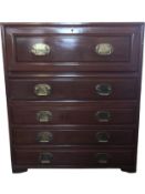 A contemporary Chinese hardwood two section military style cabinet with fitted secretaire section.