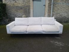 A contemporary BoConcept three seater sofa in corduroy upholstery. W.239 D.89 H.62cm.
