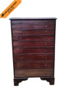 A 19th century floor standing mahogany specimen chest of nine graduating drawers on bracket feet.