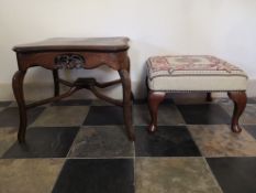 A Chinese carved hardwood low table and a tapestry upholstered footstool on cabriole supports. H.