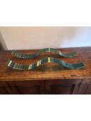 A pair of Gunta Krumins coloured art glass wall hangings. 76x8cm.