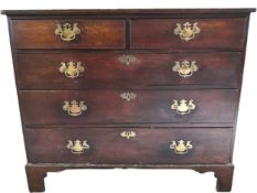 A Georgian oak chest of two short above three long drawers on bracket feet. H.92 W.110 D.51cm.