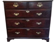 A Georgian mahogany chest of two short above three long drawers on bracket feet. H.87 W.95 D.48cm.