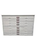 A C.1900 plan chest of eight drawers, painted and in two sections. H.83 W.122 D.90cm.