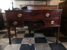 A C.1900 mahogany Georgian style bowfronted sideboard on square tapering supports. H.76 W.115 D.
