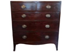 A Regency mahogany chest of two short above three long drawers on swept bracket feet. H.99 W.92 D.