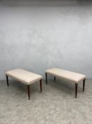 A pair of William IV foot or hearth stools each newly upholstered in calico raised on acanthus