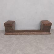 A C.1900 copper clad Art Nouveau club fender with hinged seats over a hammered flowerhead
