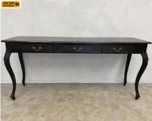 A contemporary distressed 'Blacktop' console table in the French 19th century style with three brass