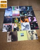A collection of nineteen vintage and modern re-pressed jazz and funk LP's to include Miles Davis,